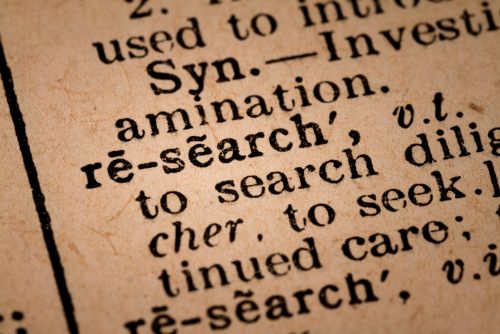 October 1st, 2015 - Montreal, Canada. Close-up of an Old 1945 Webster Vintage Dictionary showing the Word RESEARCH